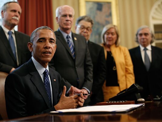 Obama signing the Energy Efficiency Improvement Act of 2015.